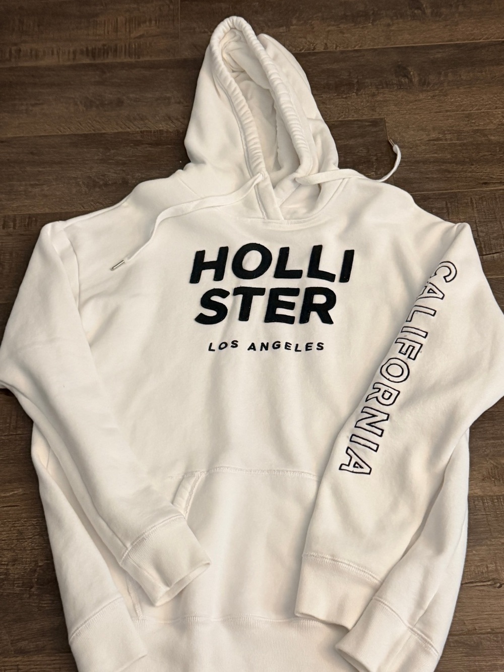 Hollister White Pullover with black Logo Patch